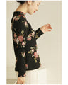 Warm and cozy with fleece lining. Elegant rose print pullover top