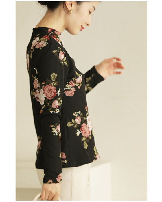 Warm and cozy with fleece lining. Elegant rose print pullover top