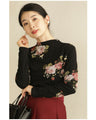 Warm and cozy with fleece lining. Elegant rose print pullover top
