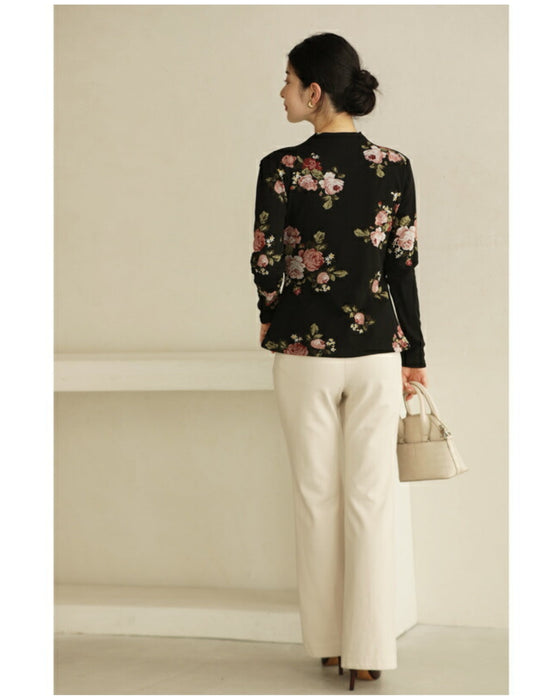 Warm and cozy with fleece lining. Elegant rose print pullover top