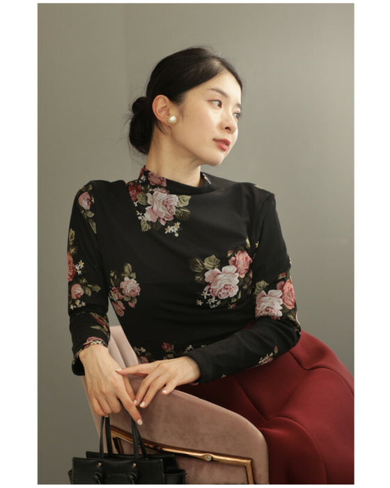 Warm and cozy with fleece lining. Elegant rose print pullover top