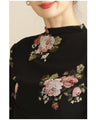 Warm and cozy with fleece lining. Elegant rose print pullover top