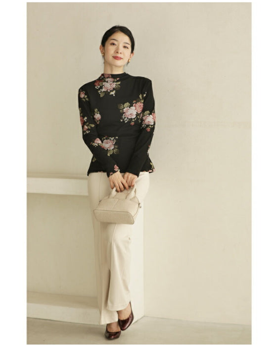 Warm and cozy with fleece lining. Elegant rose print pullover top