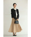 3-piece set of shoulder padded jacket, random hem skirt and corsage