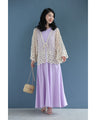 A teardrop-shaped knit lace cardigan with a flared hem