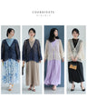 A teardrop-shaped knit lace cardigan with a flared hem