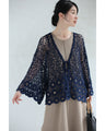 A teardrop-shaped knit lace cardigan with a flared hem