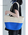 A refreshing two-tone rope tote bag