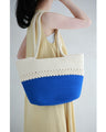 A refreshing two-tone rope tote bag
