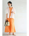 A secret A-line tuck long dress with a flared hem