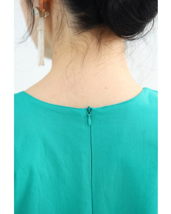 A secret A-line tuck long dress with a flared hem