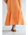 A secret A-line tuck long dress with a flared hem