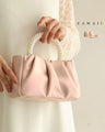 Glossy pearl-handled mini bag with strap