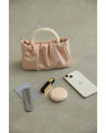 Glossy pearl-handled mini bag with strap