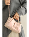 Glossy pearl-handled mini bag with strap