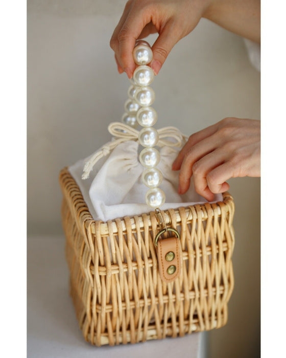 パールハンドルのスクエアかごバッグ