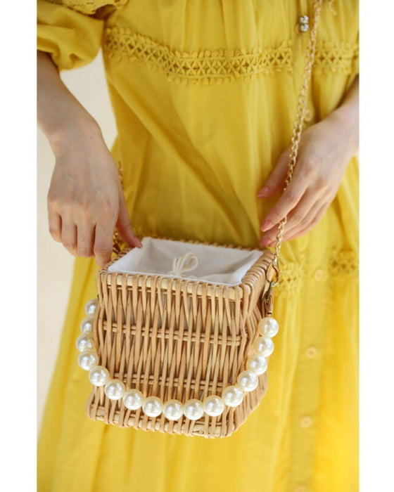 パールハンドルのスクエアかごバッグ