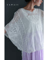 A cool dolman blouse top with embroidery and lace