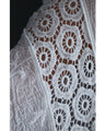 A cool dolman blouse top with embroidery and lace