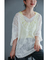 A cool dolman blouse top with embroidery and lace