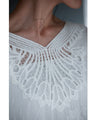 A cool dolman blouse top with embroidery and lace