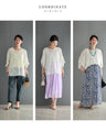 A cool dolman blouse top with embroidery and lace