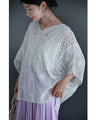 A cool dolman blouse top with embroidery and lace