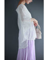 A cool dolman blouse top with embroidery and lace