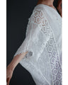A cool dolman blouse top with embroidery and lace