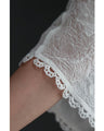 A cool dolman blouse top with embroidery and lace