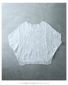 A cool dolman blouse top with embroidery and lace