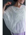 A cool dolman blouse top with embroidery and lace