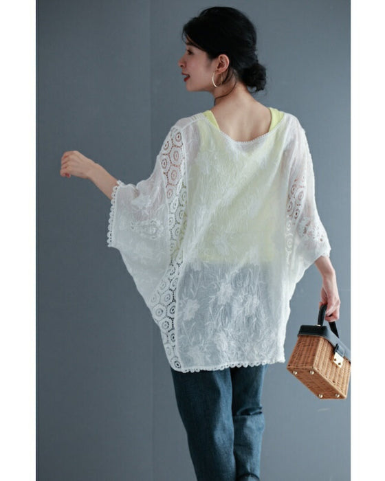 A cool dolman blouse top with embroidery and lace