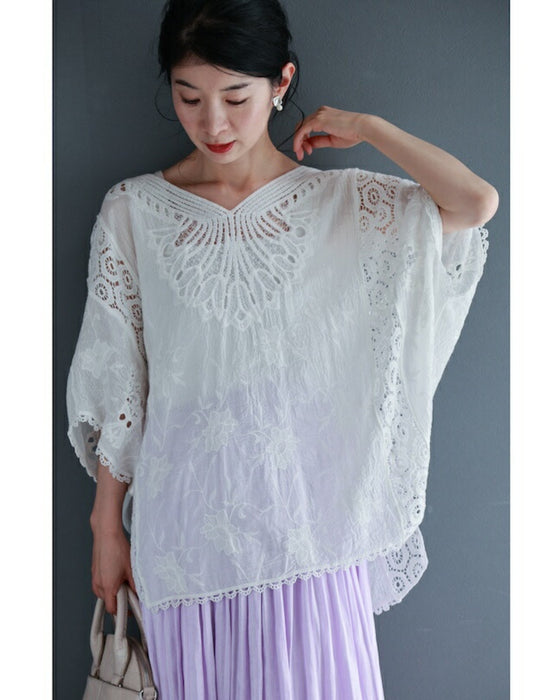 A cool dolman blouse top with embroidery and lace