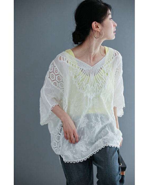 A cool dolman blouse top with embroidery and lace