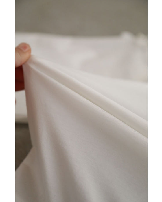 パールの粒を添えたレース窓スリーブのカットソートップス