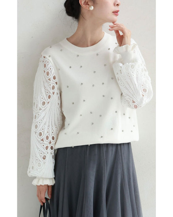 孔雀羽レース袖のビジューニットプルオーバートップス