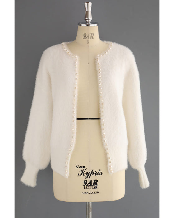 パールで囲むふわふわファーカーディガン