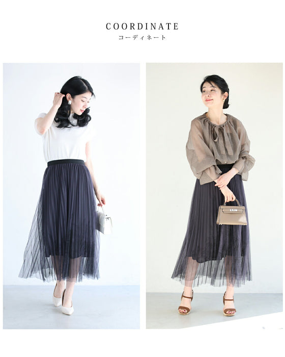街並み浮かぶシアープリーツミディアムスカート