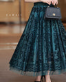 A gorgeous veiled midi skirt with a flocked pattern