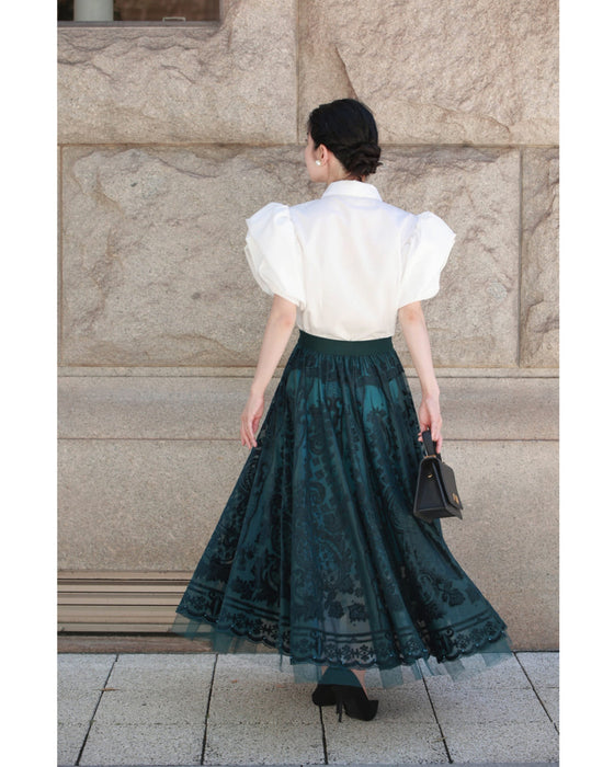 A gorgeous veiled midi skirt with a flocked pattern