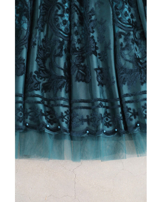 A gorgeous veiled midi skirt with a flocked pattern
