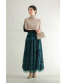 A gorgeous veiled midi skirt with a flocked pattern