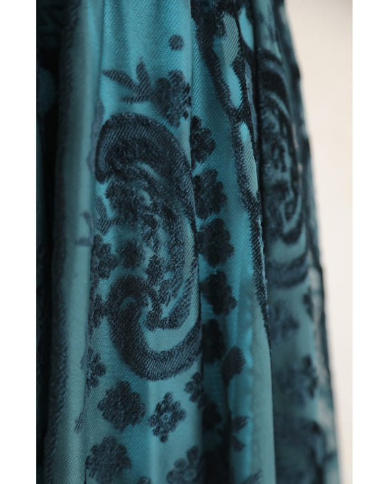 A gorgeous veiled midi skirt with a flocked pattern