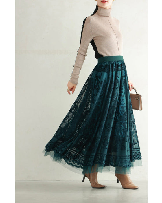 A gorgeous veiled midi skirt with a flocked pattern