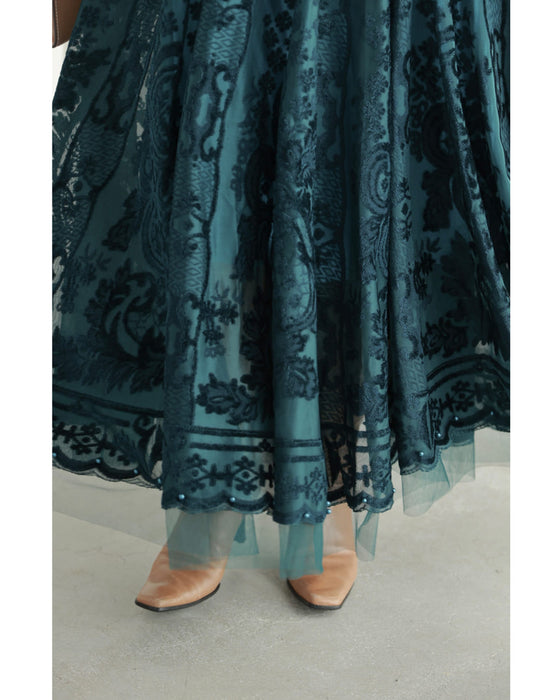 A gorgeous veiled midi skirt with a flocked pattern
