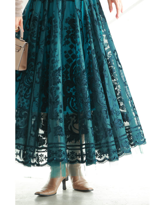 A gorgeous veiled midi skirt with a flocked pattern