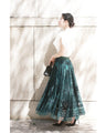 A gorgeous veiled midi skirt with a flocked pattern