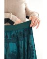 A gorgeous veiled midi skirt with a flocked pattern