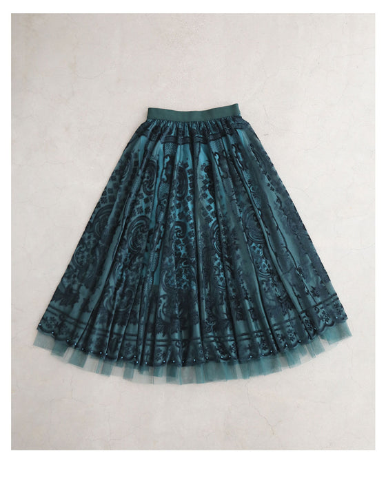 A gorgeous veiled midi skirt with a flocked pattern